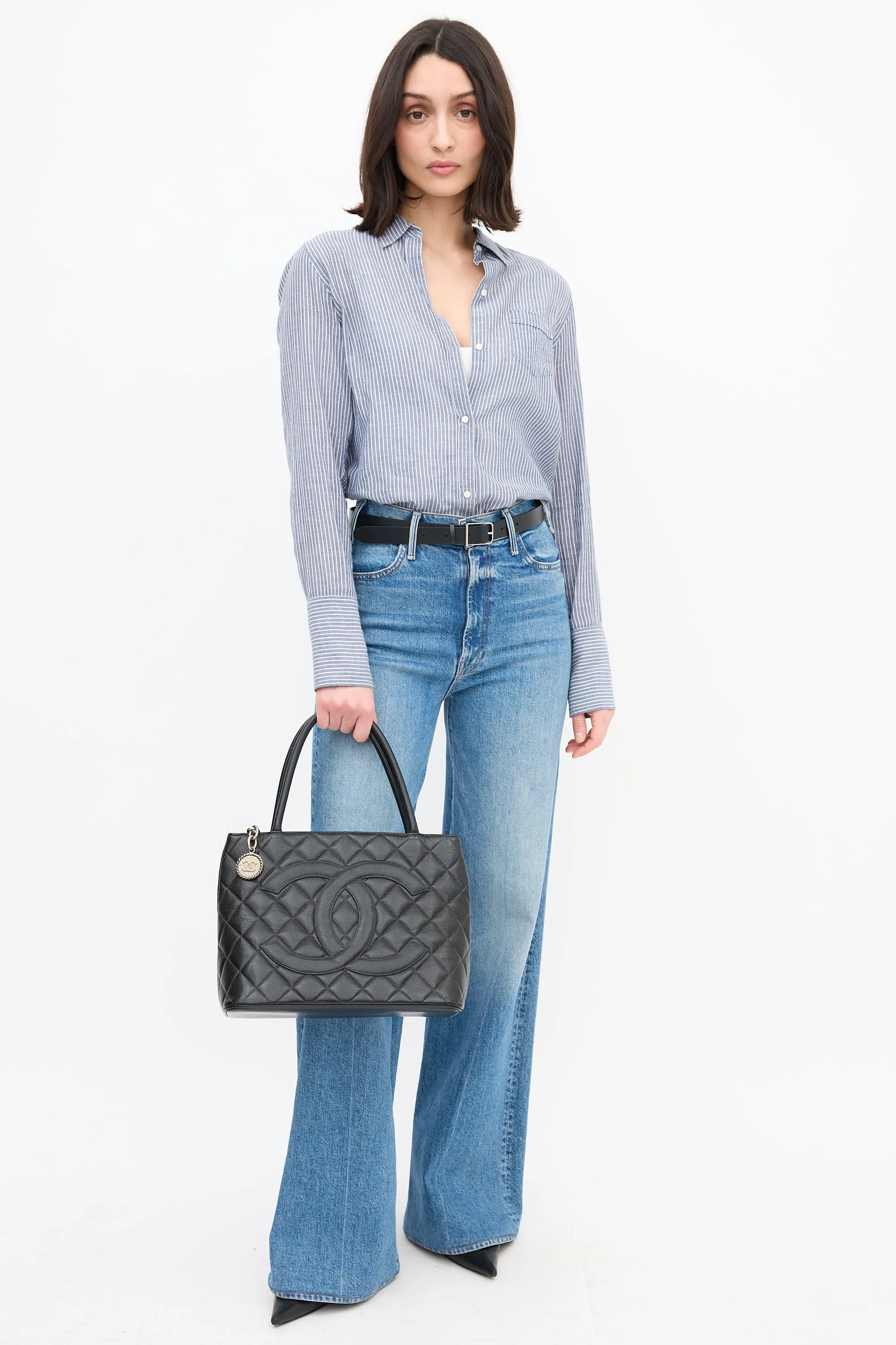 2000 Black Quilted Leather Medallion Bag