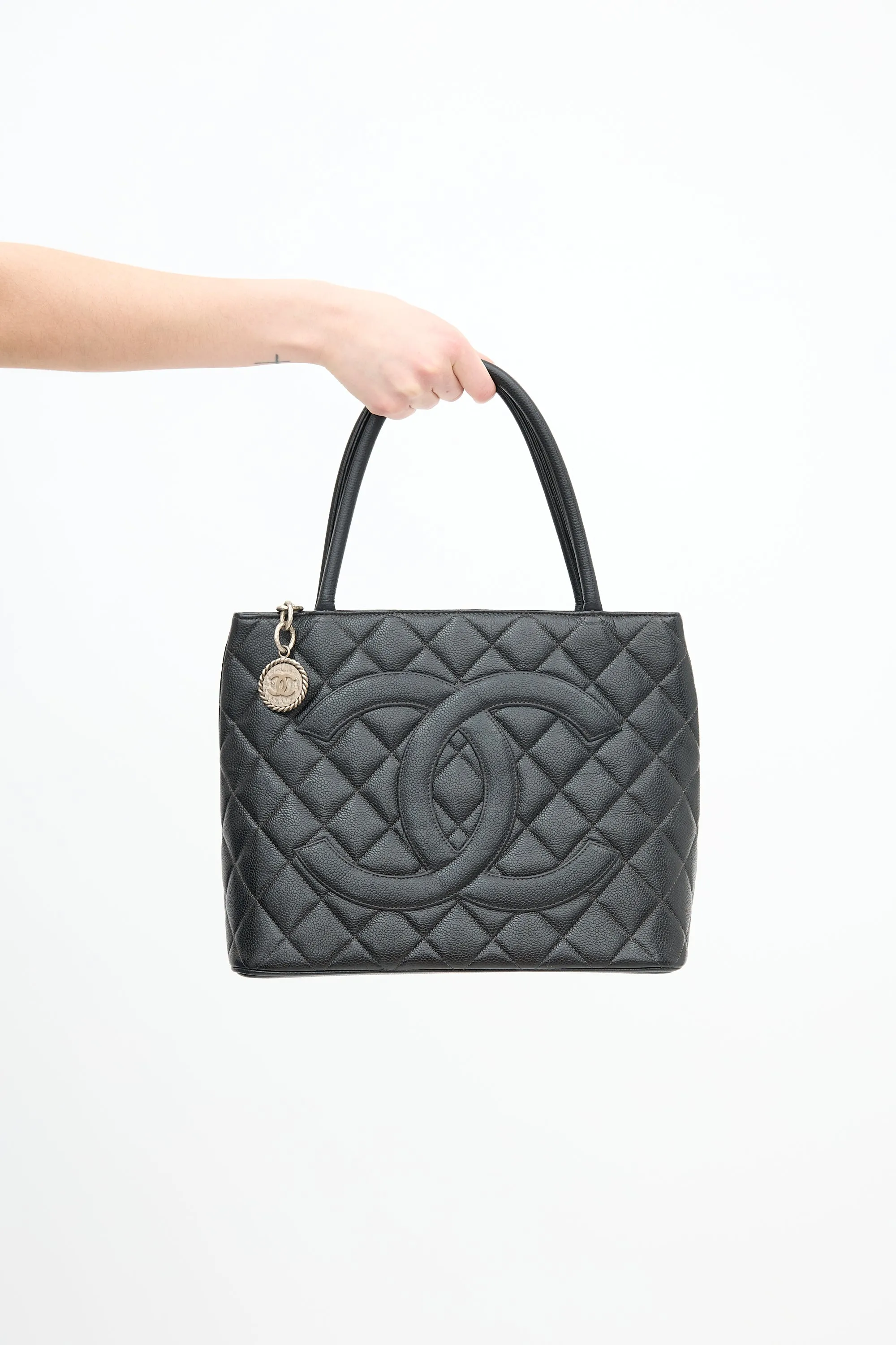 2000 Black Quilted Leather Medallion Bag