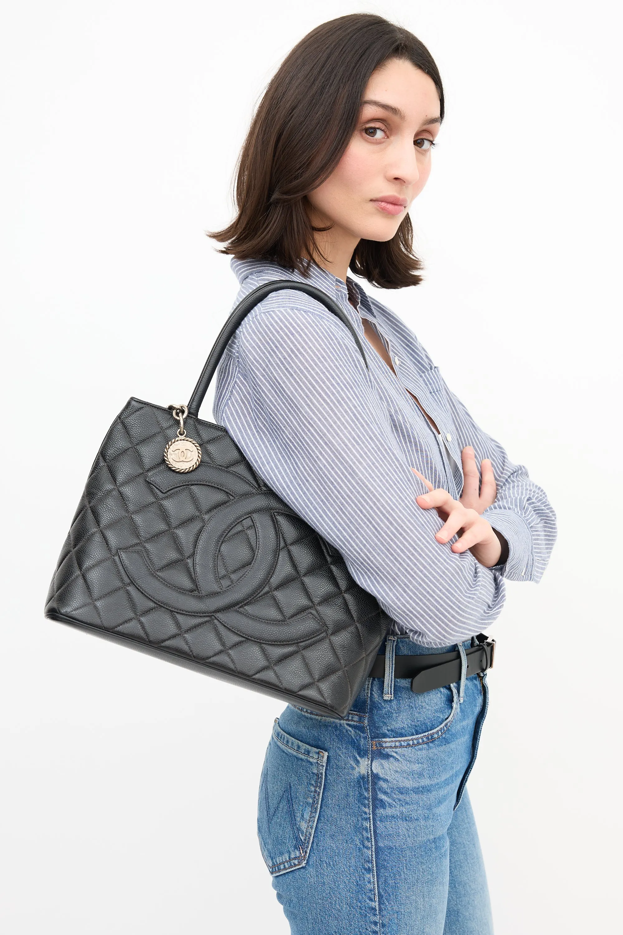 2000 Black Quilted Leather Medallion Bag