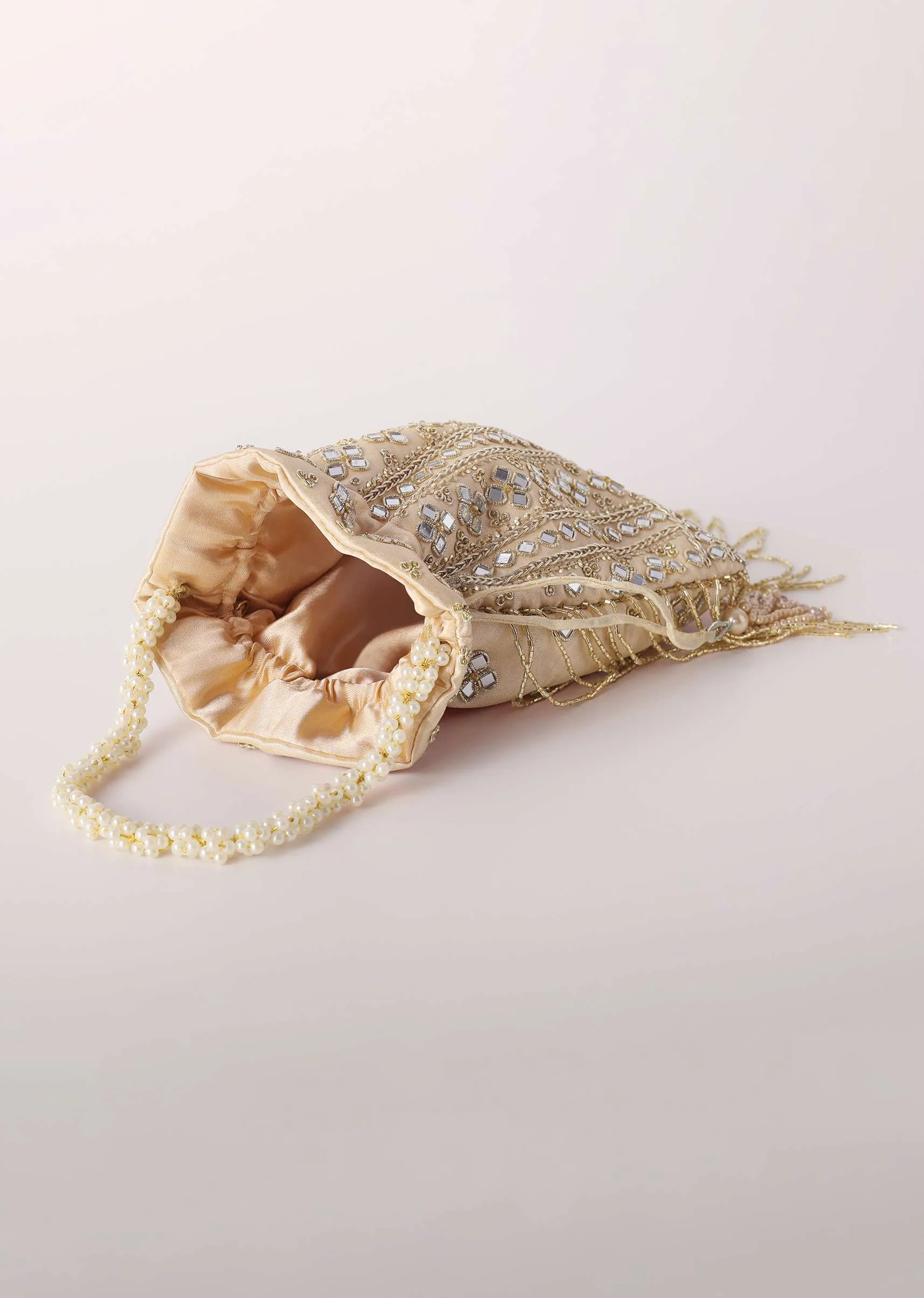 Beige Mirror Work Silk Potli With Tassels And Pearl Handle